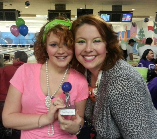 Sam and CJ at Trudy's Bowl for Kids 2013. (It was an '80s theme!)
