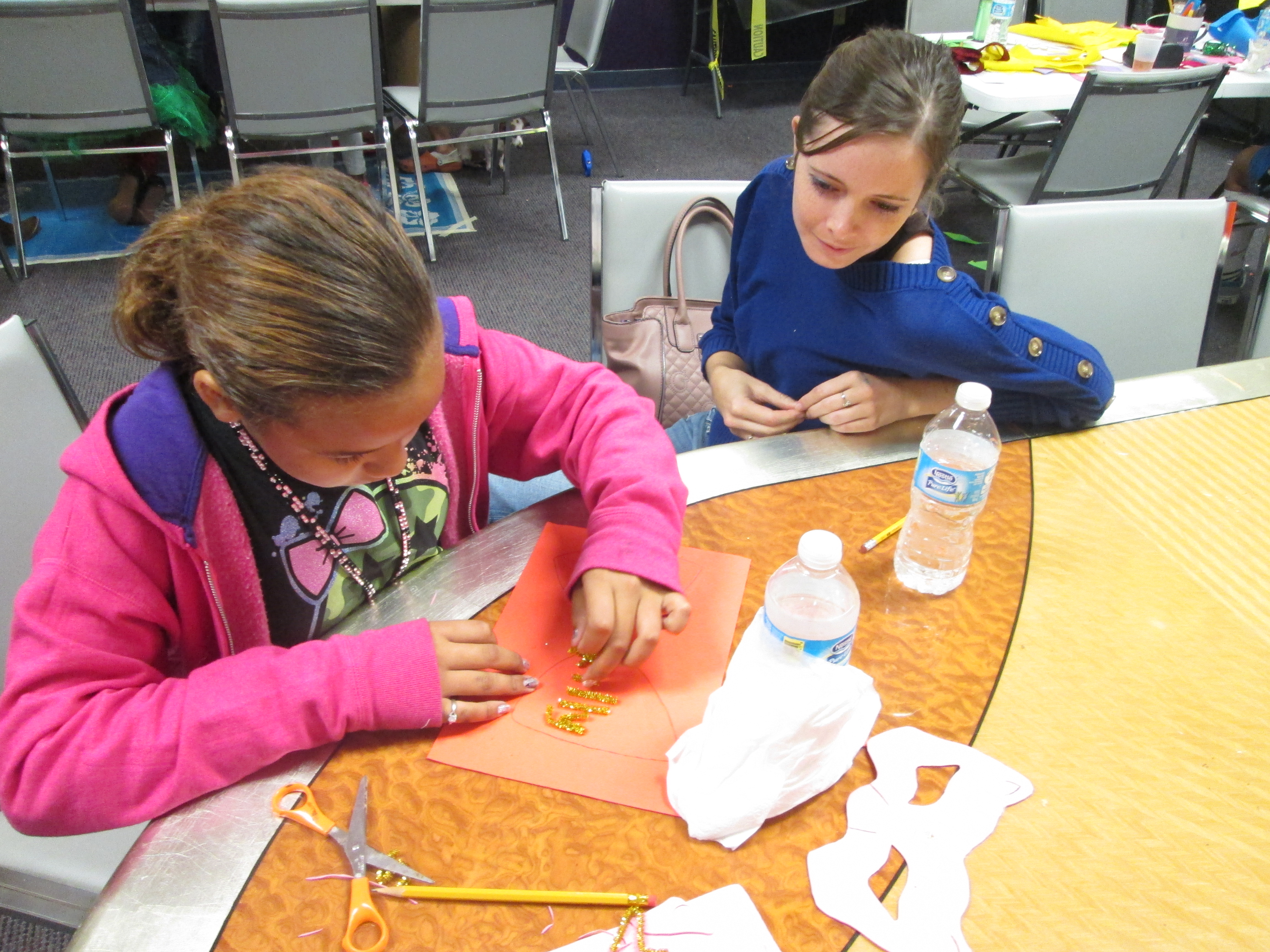 Little Sister and Big Sisters making glittery crafts!